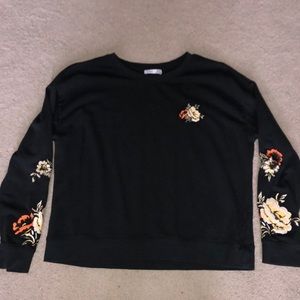 black long sleeved floral patch shirt